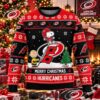 Carolina Hurricanes Snoopy And Charlie Brown Hockey 2026 Ugly Christmas Sweater